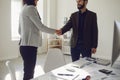 Handshake of businesspeople. Female and male hand makes a handshake in the office. Royalty Free Stock Photo