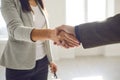 Handshake of businesspeople. Female and male hand makes a handshake in the office. Royalty Free Stock Photo