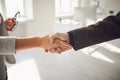 Handshake of businesspeople. Female and male hand makes a handshake in the office. Royalty Free Stock Photo