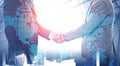 Handshake in city, international partnership Royalty Free Stock Photo