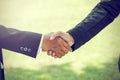 Handshake. It is a collective agreement to work. In the garden. Royalty Free Stock Photo