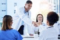 Handshake, doctors and medical meeting in agreement, collaboration and smile of teamwork, welcome or deal. Happy Royalty Free Stock Photo