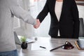 Handshake between female lawyer and male client Royalty Free Stock Photo