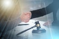 Handshake between female lawyer and male client; multiple exposure Royalty Free Stock Photo