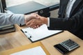 Handshake after finishing conversation Businessman sending a resignation letter to employer boss in order to resign dismiss