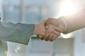 Handshake, greeting and meeting business people in an agreement or partnership in unity, trust and support. Closeup of Royalty Free Stock Photo