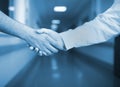 Handshake in the hospital corridor