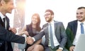 Handshake Manager and the client at a meeting in the office lobby. Royalty Free Stock Photo