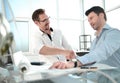 Handshake Manager and client near the table Royalty Free Stock Photo