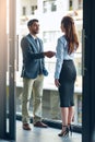 Handshake, meeting and business man and woman in office for teamwork, collaboration and partnership. Corporate office Royalty Free Stock Photo