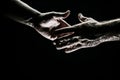 Handshake. Men holding hands isolated on black. Connection and human relations. Male hands rescue. Friendly handshake Royalty Free Stock Photo