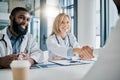 Handshake, partnership or happy doctors in a meeting after successful medical surgery or reaching healthcare goals Royalty Free Stock Photo