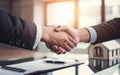 Handshake between real estate or bank agent and a new house owner after signing a property purchase contract, rental, loan or Royalty Free Stock Photo