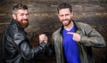 Handshake symbol of successful deal. Approved business deal. Handshake gesture meaning. Have agreed. Brutal bearded men Royalty Free Stock Photo