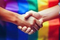 Embracing diversity: handshake against LGBT rainbow flag background - Generative AI