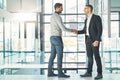 Handshake, teamwork and working together with corporate business men and colleagues at work as a team. Making a deal Royalty Free Stock Photo