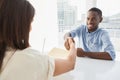 Handshake to seal a deal after a business meeting