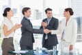 Handshake to seal a deal after a job recruitment meeting