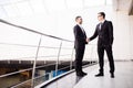 Handshake of two business men closing a deal at the office Royalty Free Stock Photo