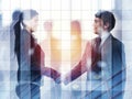 Handshake of two businessperson in office concept of partnership and teamwork.double exposure Royalty Free Stock Photo