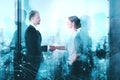 Handshake of two businessperson in office with network effect. concept of partnership and teamwork