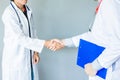 Handshake between two doctors ,meeting,Medical, Healthy Concept Royalty Free Stock Photo