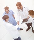 Handshake two doctors at the meeting. Royalty Free Stock Photo