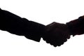 Handshake of two men, businessman and worker - horizontal silhouette Royalty Free Stock Photo