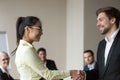 Handshake of two smiling happy business people Royalty Free Stock Photo