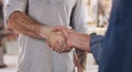 Handshake, welcome and partnership with men in a workshop together for a deal or agreement. Teamwork, meeting and