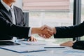 Handshaking. Two businessman shaking hands during a success meeting Royalty Free Stock Photo