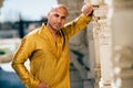 Handsom Indian Man in Gold Kurta at the Temple