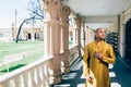 Handsom Indian Man in Gold Kurta at the Temple