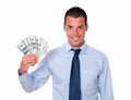 Handsome adult guy holding up cash money