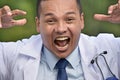 Crazy Male Doctor Wearing Lab Coat Royalty Free Stock Photo