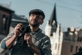 handsome adult man with vintage film camera in old Royalty Free Stock Photo