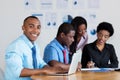 Handsome african american businessman with business team at office Royalty Free Stock Photo