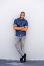 Handsome african american guy smiling with arms crossed Royalty Free Stock Photo