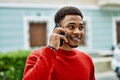 Handsome african american man outdoors speaking on the phone Royalty Free Stock Photo