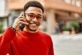 Handsome african american man outdoors speaking on the phone Royalty Free Stock Photo