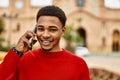 Handsome african american man outdoors speaking on the phone Royalty Free Stock Photo