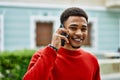 Handsome african american man outdoors speaking on the phone Royalty Free Stock Photo