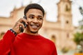 Handsome african american man outdoors speaking on the phone Royalty Free Stock Photo