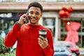 Handsome african american man outdoors speaking on the phone Royalty Free Stock Photo