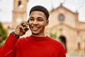 Handsome african american man outdoors speaking on the phone Royalty Free Stock Photo