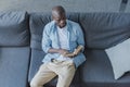 Handsome african american man reading book Royalty Free Stock Photo