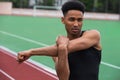 Handsome african athlete man make stretching exercises Royalty Free Stock Photo