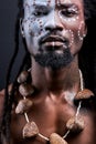 Handsome afro american guy with authentic chain on neck look at camera Royalty Free Stock Photo