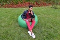 Handsome Arab Young Businessman Sits With Laptop in Chair, Looks Royalty Free Stock Photo