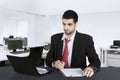Handsome Arabian businessman works in office Royalty Free Stock Photo